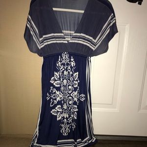 Navy blue dress with white details. Size L